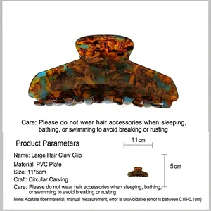 Detailed view of large French claw clip with elegant tortoiseshell pattern and dimensions.