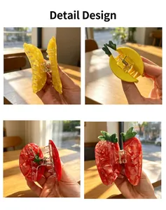 Close-up of fruit-shaped acetic acid hair clips including strawberry and pineapple.
