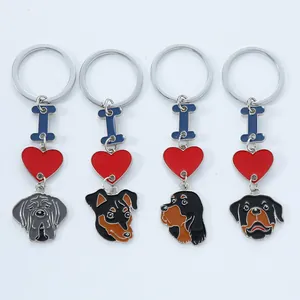 Set of four cute enamel dog breed keychains with red heart and I symbol charms