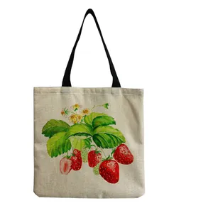 Reusable cotton linen shopping tote bag with realistic strawberry print detail