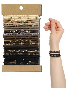 Detailed view of a multi-pack bohemian style hair ties set on card and worn as bracelets