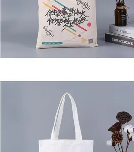 Close-up of canvas tote bag featuring artistic graphic print and Chinese calligraphy.