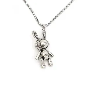 Detailed macro shot of a movable mechanical rabbit pendant on a silver hip-hop chain