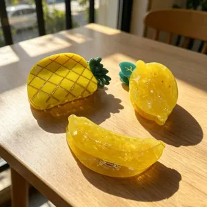 Summer fruit-shaped acetate hair clips featuring pineapple banana and lemon designs