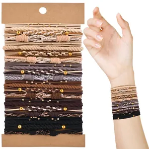 Detail view of bohemian hair tie set showing various textures and wearing demonstration