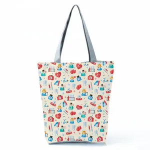 Detailed view of canvas tote bag featuring medical nurse and doctor cartoon patterns