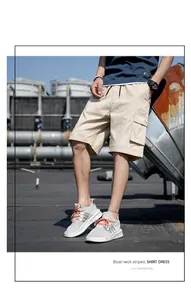 Short cargo kaki pour homme porté par un mannequin dans un décor industriel extérieur