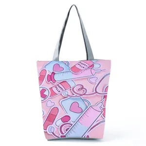 Detailed close-up view of creative cartoon nurse print on a pink women's beach tote bag