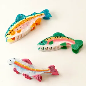 Set of colorful cellulose acetate fish hair claw clips with realistic salmon designs