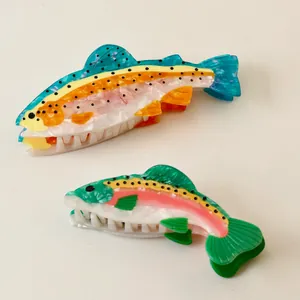 Colorful acetate fish hair claw clips with rainbow trout and salmon designs for women