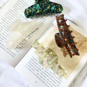 Elegant French large hair claw clips with tortoiseshell and marble patterns for thick hair