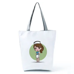 White canvas tote bag featuring a cute cartoon nurse print for daily shopping use