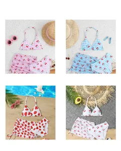 Four styles of girls' 3-piece swimwear with fruit prints and halter neck design.