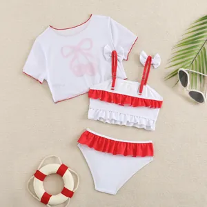 Cute 3-piece girls swimwear set featuring cherry print mesh top and red ruffle bikini outfit