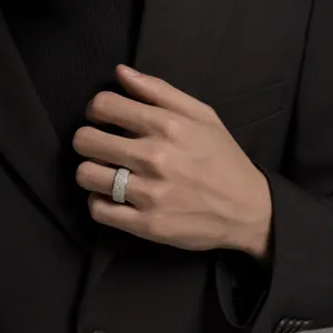Detail shot of a professional hand model wearing an 8mm silver five-row diamond ring.