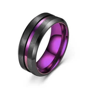 Black stainless steel ring with brushed finish and vibrant purple interior groove