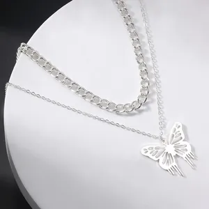 Fashion silver layered necklace for women featuring hollow butterfly pendant and thick curb chain