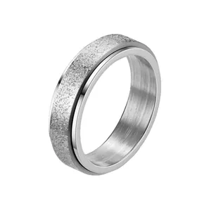 Frosted silver stainless steel spinner ring for men featuring a rotatable stress-relief design