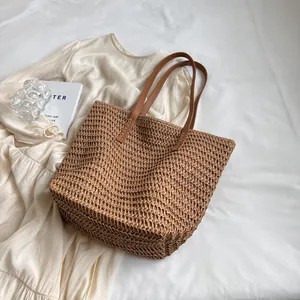 Large capacity straw woven beach bag with brown leather straps