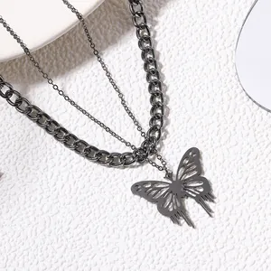 Close-up view of a double-layer necklace featuring a hollow butterfly pendant.