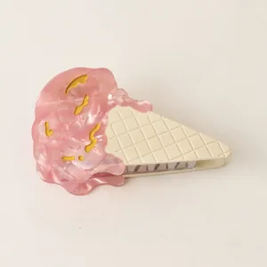 Detailed macro view of the pink marble textured ice cream acetate hair claw clip
