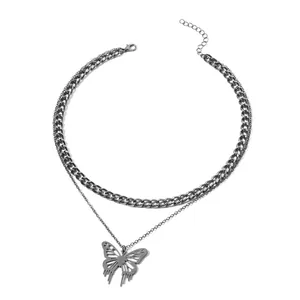 Double layered butterfly pendant necklace with thick curb chain and thin link