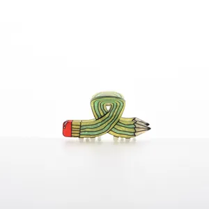 Creative green pencil-shaped hair claw clip with translucent finish for unique updos