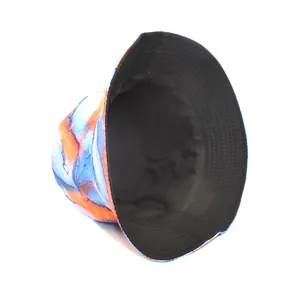 Detailed view of reversible bucket hat featuring vibrant orange and blue marble print