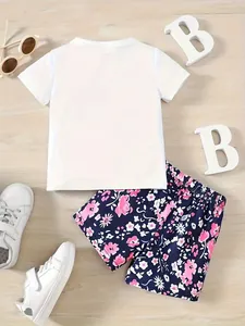 Girls summer outfit set featuring white t-shirt and pink floral printed shorts