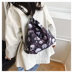 Back view detail of a skull and floral print multi-functional backpack tote bag