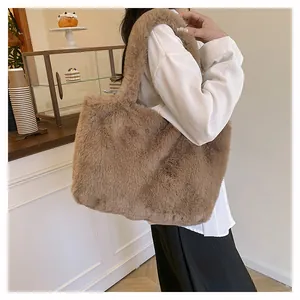 Detailed view of a large brown faux fur tote bag perfect for autumn and winter outfits.