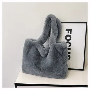 Stylish grey plush faux fur tote bag for women showing soft material and large capacity.