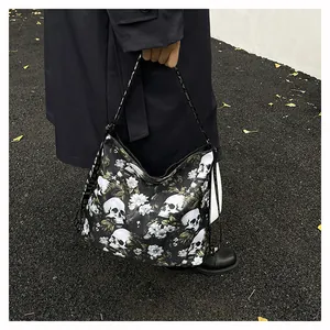 Detailed view of this large capacity tote bag featuring a bold skull and floral print design.