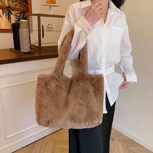 Fashionable brown plush tote bag for women featuring soft faux fur texture