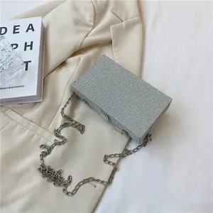 Elegant silver textured box camera clutch bag with metallic chain strap for women