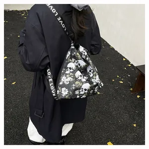Detail view of the stylish skull and floral print on the large capacity backpack