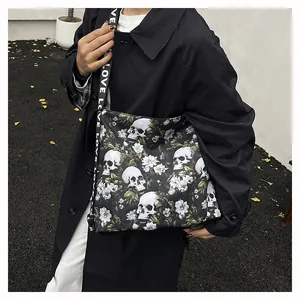 Large capacity tote bag featuring skull and floral prints styled on a model