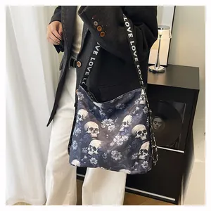 Detailed view of a large capacity tote bag featuring a trendy skull floral print.