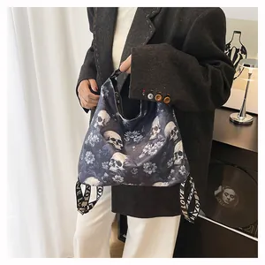 Detail of a large capacity backpack with skull and floral print worn by a woman.