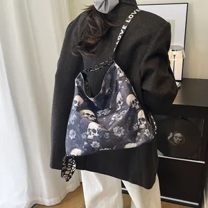 Trendy large skull and floral print tote bag with 'LOVE' patterned strap for fashion women