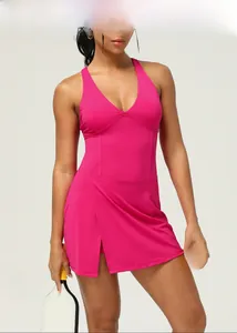 Detailed view of fuchsia quick-dry sleeveless athletic dress with sexy front slit