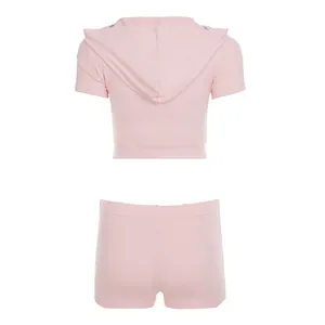 Back view of a pink hooded short-sleeve top and matching shorts two-piece sports set