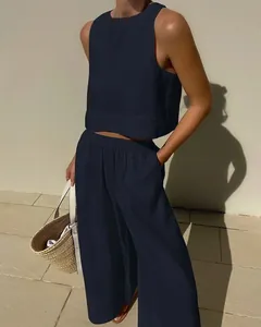 Detailed view of casual navy two-piece set with sleeveless top and wide-leg trousers