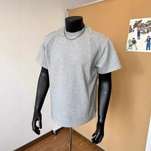 Detail view of a grey vintage crew neck short sleeve T-shirt on a black mannequin