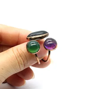 Vintage adjustable open ring featuring three colorful raw stones on copper band