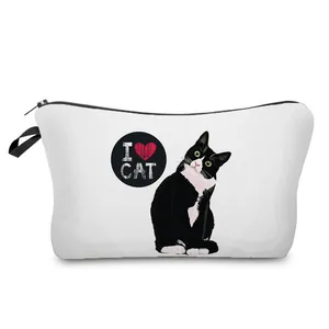Cute black and white cat print cosmetic bag for women, stylish travel makeup pouch.