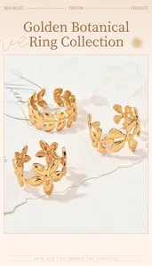Detail view of golden plant-themed rings featuring intricate flower and leaf designs