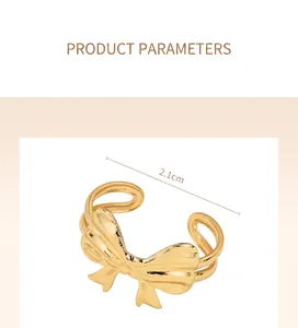 Detailed macro view of a vintage gold bow ring featuring a 2.1cm diameter measurement