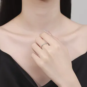 Elegant minimalist 925 sterling silver 2mm plain band ring shown on model finger