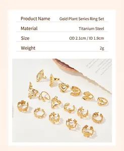 Detailed view of vintage gold-plated titanium steel rings with botanical leaf designs